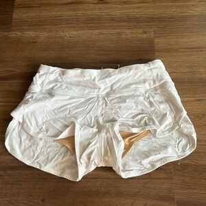 White Lululemon Shorts.